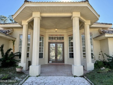 This once elegant home is needing some attention today but with on The Grand Club Cypress Course in Florida - for sale on GolfHomes.com, golf home, golf lot