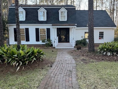 Welcome to this inviting two-story home situated on nearly an on The Founders Club At Pawleys Island in South Carolina - for sale on GolfHomes.com, golf home, golf lot