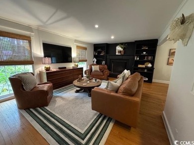 Welcome to this inviting two-story home situated on nearly an on The Founders Club At Pawleys Island in South Carolina - for sale on GolfHomes.com, golf home, golf lot