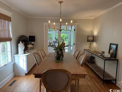 Welcome to this inviting two-story home situated on nearly an on The Founders Club At Pawleys Island in South Carolina - for sale on GolfHomes.com, golf home, golf lot