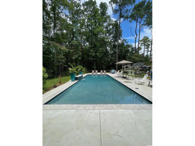 Welcome to this inviting two-story home situated on nearly an on The Founders Club At Pawleys Island in South Carolina - for sale on GolfHomes.com, golf home, golf lot