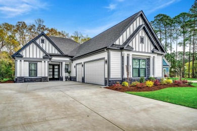 Discover an exquisite blend of style and modern convenience at on Wild Wing Plantation in South Carolina - for sale on GolfHomes.com, golf home, golf lot