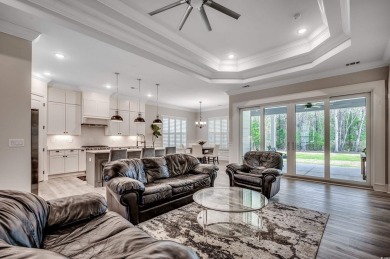 Discover an exquisite blend of style and modern convenience at on Wild Wing Plantation in South Carolina - for sale on GolfHomes.com, golf home, golf lot