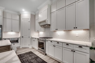 Discover an exquisite blend of style and modern convenience at on Wild Wing Plantation in South Carolina - for sale on GolfHomes.com, golf home, golf lot