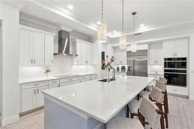 Coastal first-floor end unit with no neighboring building next on Windstar on Naples Bay in Florida - for sale on GolfHomes.com, golf home, golf lot