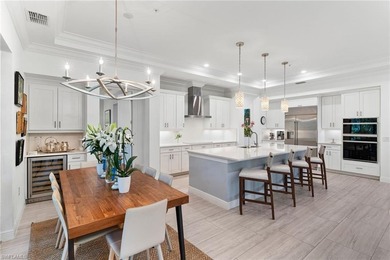 Coastal first-floor end unit with no neighboring building next on Windstar on Naples Bay in Florida - for sale on GolfHomes.com, golf home, golf lot