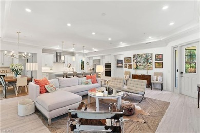 Coastal first-floor end unit with no neighboring building next on Windstar on Naples Bay in Florida - for sale on GolfHomes.com, golf home, golf lot