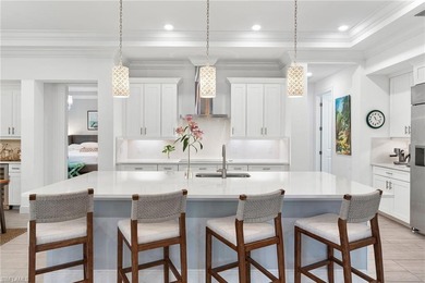 Coastal first-floor end unit with no neighboring building next on Windstar on Naples Bay in Florida - for sale on GolfHomes.com, golf home, golf lot