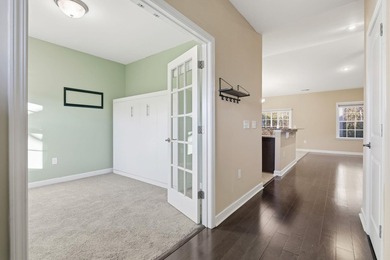 Welcome home! Tucked away in the quiet, low-HOA North Village on Palmetto Greens Golf and Country Club in South Carolina - for sale on GolfHomes.com, golf home, golf lot