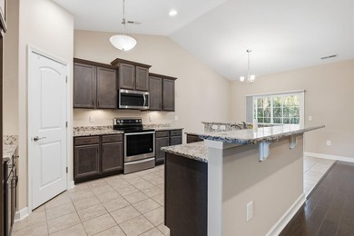 Welcome home! Tucked away in the quiet, low-HOA North Village on Palmetto Greens Golf and Country Club in South Carolina - for sale on GolfHomes.com, golf home, golf lot