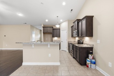 Welcome home! Tucked away in the quiet, low-HOA North Village on Palmetto Greens Golf and Country Club in South Carolina - for sale on GolfHomes.com, golf home, golf lot