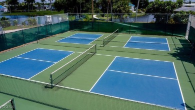 This spacious corner-lot home in Old Bridge Village, a vibrant on Riverbend Golf and Country Club in Florida - for sale on GolfHomes.com, golf home, golf lot