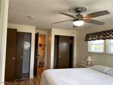 This spacious corner-lot home in Old Bridge Village, a vibrant on Riverbend Golf and Country Club in Florida - for sale on GolfHomes.com, golf home, golf lot