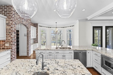 Welcome to an extraordinary luxury estate offering unmatched on Champions Retreat Golf Club in Georgia - for sale on GolfHomes.com, golf home, golf lot