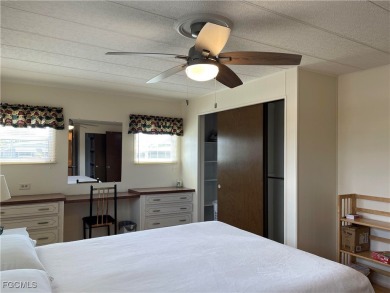 This spacious corner-lot home in Old Bridge Village, a vibrant on Riverbend Golf and Country Club in Florida - for sale on GolfHomes.com, golf home, golf lot