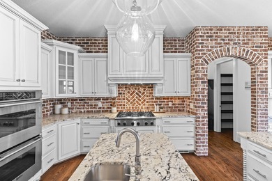 Welcome to an extraordinary luxury estate offering unmatched on Champions Retreat Golf Club in Georgia - for sale on GolfHomes.com, golf home, golf lot