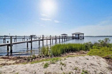 Come write your next chapter in this southern-charmer on Old on Lost Key Golf Club in Florida - for sale on GolfHomes.com, golf home, golf lot