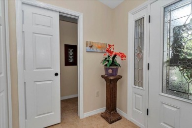 Step inside and be greeted by sweeping golf course views from on Summerglen Country Club in Florida - for sale on GolfHomes.com, golf home, golf lot