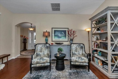 Step inside and be greeted by sweeping golf course views from on Summerglen Country Club in Florida - for sale on GolfHomes.com, golf home, golf lot
