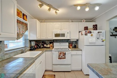 Nestled in the vibrant 55+ community of Sunrise Lakes, this on Sunrise Lakes Phase III in Florida - for sale on GolfHomes.com, golf home, golf lot
