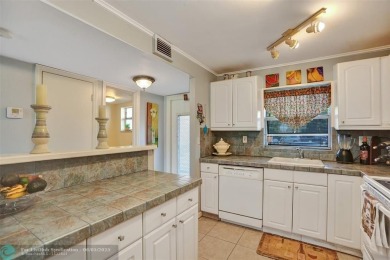 Nestled in the vibrant 55+ community of Sunrise Lakes, this on Sunrise Lakes Phase III in Florida - for sale on GolfHomes.com, golf home, golf lot