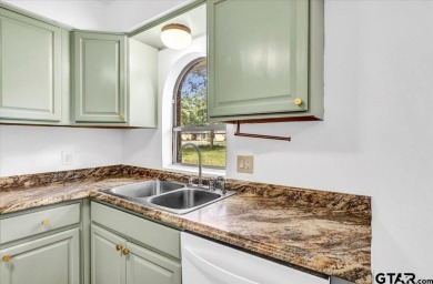 Welcome to your serene retreat in the gated community of on Hide-A-Way Lake Golf Course in Texas - for sale on GolfHomes.com, golf home, golf lot