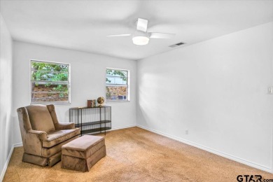 Welcome to your serene retreat in the gated community of on Hide-A-Way Lake Golf Course in Texas - for sale on GolfHomes.com, golf home, golf lot
