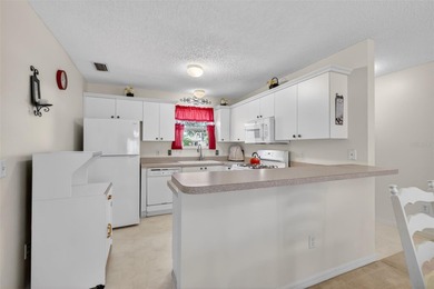 CHARMING 2/2 Laredo with OPEN-CONCEPT design, SPLIT FLOOR PLAN on Glenview Championship Golf and Country Club in Florida - for sale on GolfHomes.com, golf home, golf lot