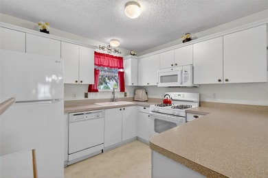 CHARMING 2/2 Laredo with OPEN-CONCEPT design, SPLIT FLOOR PLAN on Glenview Championship Golf and Country Club in Florida - for sale on GolfHomes.com, golf home, golf lot