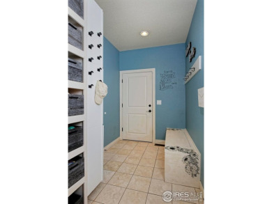 Stunning home in private golf course community features a on Fox Hill Country Club in Colorado - for sale on GolfHomes.com, golf home, golf lot