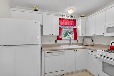 CHARMING 2/2 Laredo with OPEN-CONCEPT design, SPLIT FLOOR PLAN on Glenview Championship Golf and Country Club in Florida - for sale on GolfHomes.com, golf home, golf lot