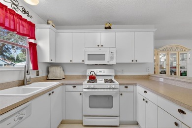 CHARMING 2/2 Laredo with OPEN-CONCEPT design, SPLIT FLOOR PLAN on Glenview Championship Golf and Country Club in Florida - for sale on GolfHomes.com, golf home, golf lot