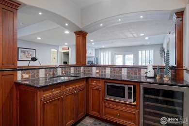 Stunning home in private golf course community features a on Fox Hill Country Club in Colorado - for sale on GolfHomes.com, golf home, golf lot