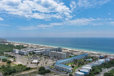 This beautifully updated penthouse unit has a spectacular view on Kiva Dunes Golf Club in Alabama - for sale on GolfHomes.com, golf home, golf lot