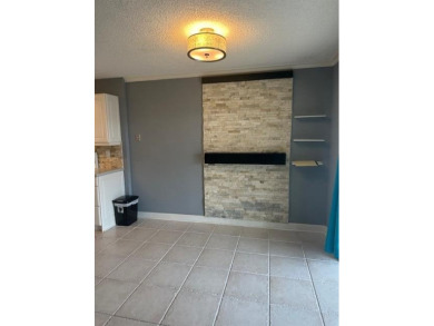 Move in ready 2 bedroom, 2 bathroom, updated villa with 2 on Cypress Lakes Golf Course - West Palm Beach in Florida - for sale on GolfHomes.com, golf home, golf lot