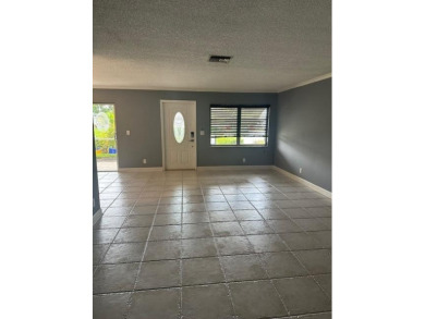 Move in ready 2 bedroom, 2 bathroom, updated villa with 2 on Cypress Lakes Golf Course - West Palm Beach in Florida - for sale on GolfHomes.com, golf home, golf lot