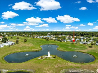 Nestled in the desirable 55+ gated community of Spruce Creek on The Links of Spruce Creek in Florida - for sale on GolfHomes.com, golf home, golf lot