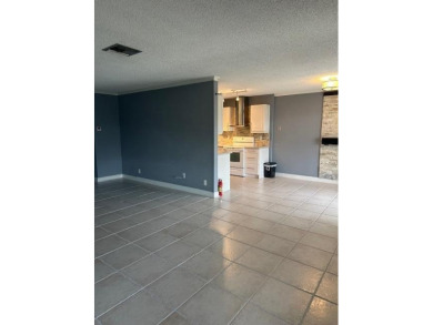 Move in ready 2 bedroom, 2 bathroom, updated villa with 2 on Cypress Lakes Golf Course - West Palm Beach in Florida - for sale on GolfHomes.com, golf home, golf lot