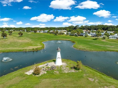 Nestled in the desirable 55+ gated community of Spruce Creek on The Links of Spruce Creek in Florida - for sale on GolfHomes.com, golf home, golf lot