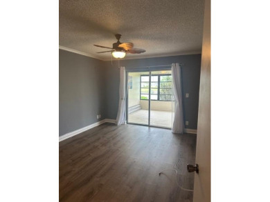 Move in ready 2 bedroom, 2 bathroom, updated villa with 2 on Cypress Lakes Golf Course - West Palm Beach in Florida - for sale on GolfHomes.com, golf home, golf lot