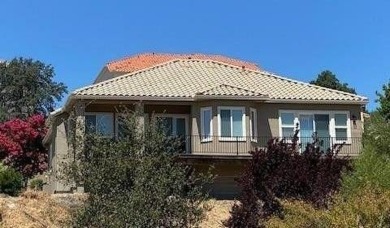 Welcome to 142 Athena Drive, your Happy Place at the lake! If on The Club at Copper Valley Golf Course in California - for sale on GolfHomes.com, golf home, golf lot