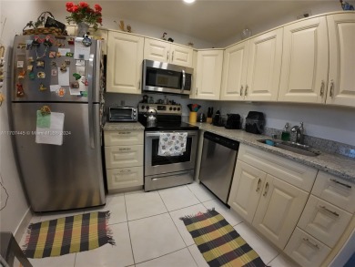 Exciting opportunity alert! Stunning 1 bed, 1.5 bath plus den on Addison Reserve in Florida - for sale on GolfHomes.com, golf home, golf lot