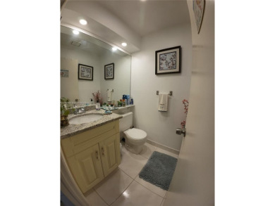 Exciting opportunity alert! Stunning 1 bed, 1.5 bath plus den on Addison Reserve in Florida - for sale on GolfHomes.com, golf home, golf lot