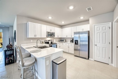 This 2023-built 2-bedroom + den, 2-bathroom attached villa is on Herons Glen Golf and Country Club in Florida - for sale on GolfHomes.com, golf home, golf lot