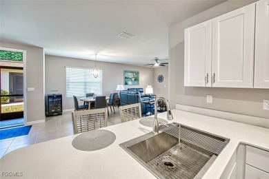 This 2023-built 2-bedroom + den, 2-bathroom attached villa is on Herons Glen Golf and Country Club in Florida - for sale on GolfHomes.com, golf home, golf lot