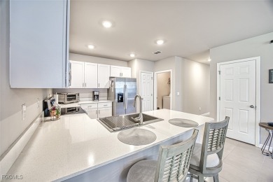 This 2023-built 2-bedroom + den, 2-bathroom attached villa is on Herons Glen Golf and Country Club in Florida - for sale on GolfHomes.com, golf home, golf lot