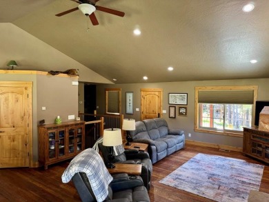 Exceptional custom-built home on over 6 acres, bordered by tens on Double Arrow Lodge in Montana - for sale on GolfHomes.com, golf home, golf lot