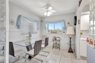 ENJOY STUNNING LAKE VIEWS from your balcony! This LARGEST CORNER on Flamingo Lakes Country Club in Florida - for sale on GolfHomes.com, golf home, golf lot