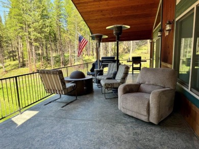 Exceptional custom-built home on over 6 acres, bordered by tens on Double Arrow Lodge in Montana - for sale on GolfHomes.com, golf home, golf lot