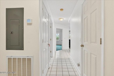 PRICE REDUCTION! Bright, spacious, and full of potential--this on Brunswick Plantation and Golf Resorts in North Carolina - for sale on GolfHomes.com, golf home, golf lot